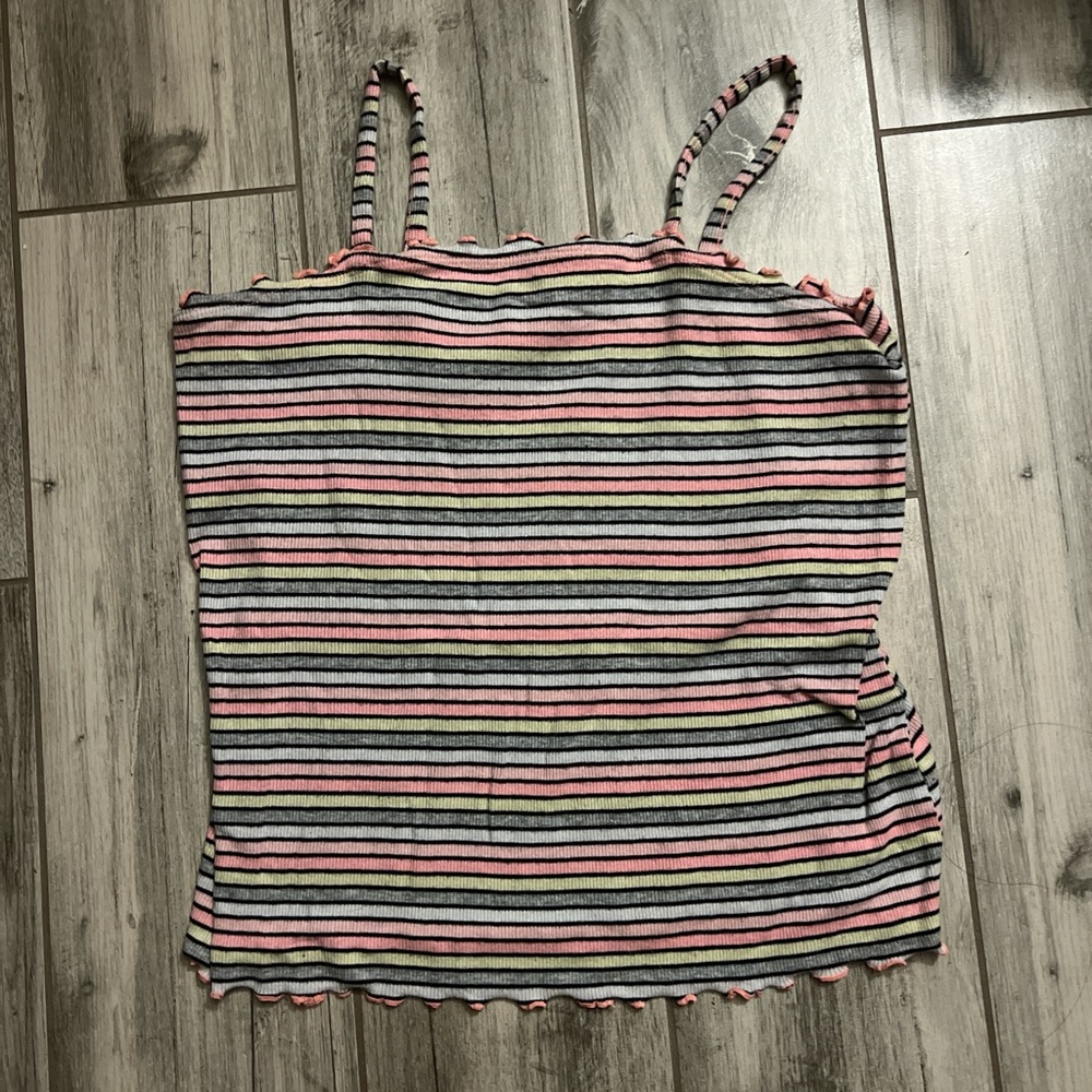 Multicolored Justice tank top with a lettuce hem.
